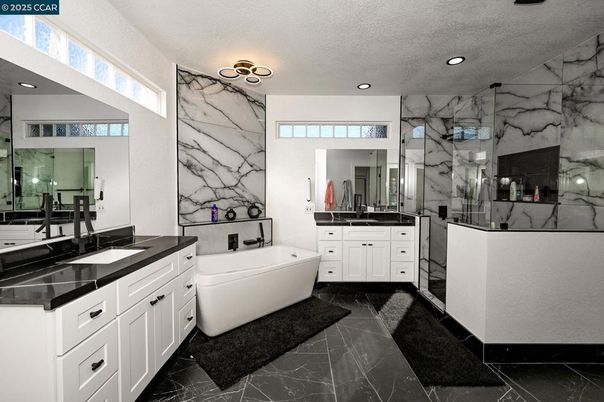 Bathroom, Dual Sink Vanities, Interior, Marble, Marble Walls, Recessed Lighting