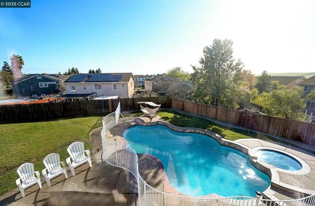 Exterior, Pool, Solar Panels