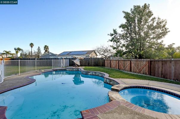 Exterior, Pool, Solar Panels