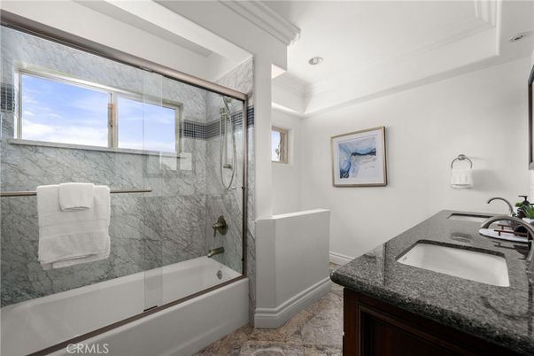Bathroom, Dual Sink Vanities, Glass Shower, Interior, Marble Walls, Recessed Lighting