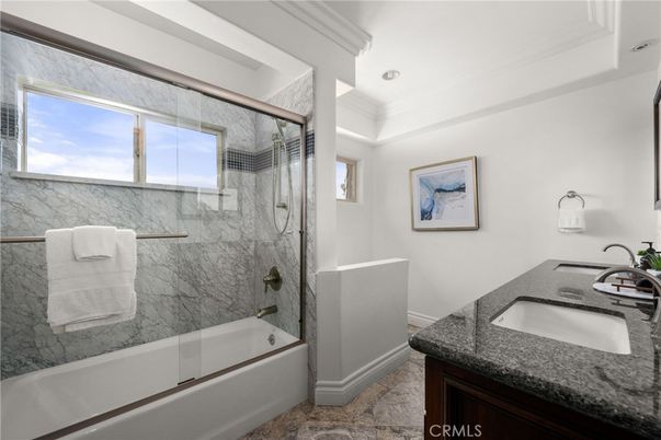 Bathroom, Dual Sink Vanities, Glass Shower, Interior, Marble Walls, Recessed Lighting