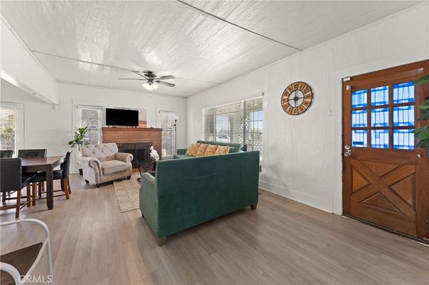 Dining room, Fireplace, Interior, Living room, Wood Texture Flooring