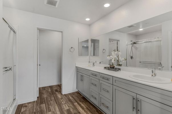 Bathroom, Dual Sink Vanities, Interior, Recessed Lighting, Wood Texture Flooring