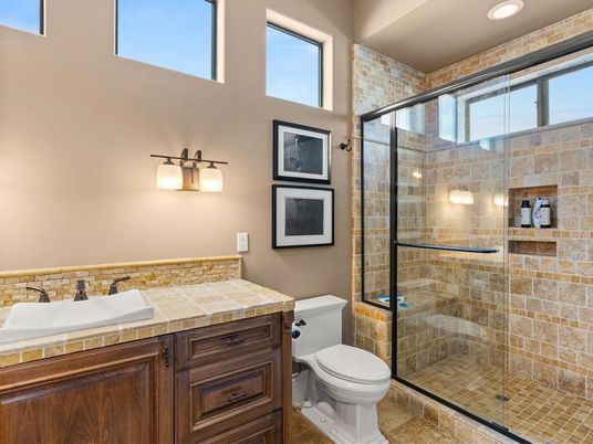 Bathroom, Glass Shower, Interior, Recessed Lighting, Stone Walls, Tile Countertops