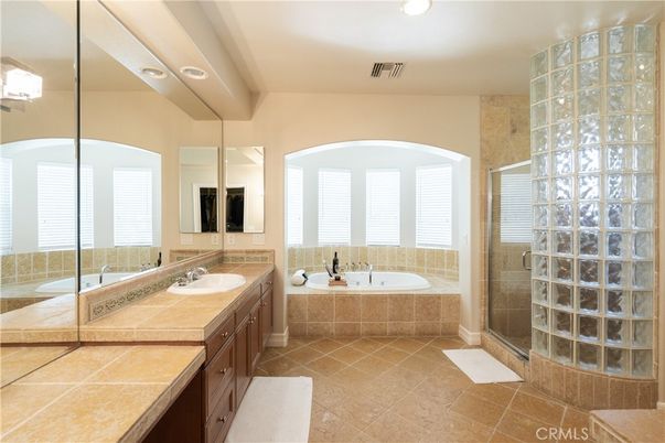 Bathroom, Dual Sink Vanities, Glass Shower, Interior, Recessed Lighting, Tile Countertops