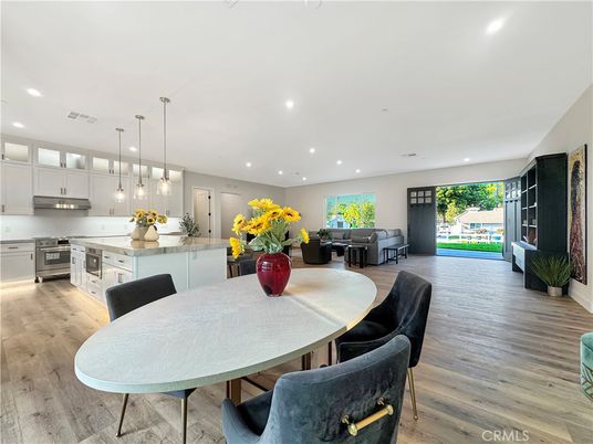 Dining room, Interior, Kitchen, Pendant Lights, Recessed Lighting, Stainless Steel Appliances, Wood Texture Flooring
