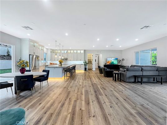 Dining room, Interior, Kitchen, Living room, Pendant Lights, Recessed Lighting, Stainless Steel Appliances, Wood Texture Flooring