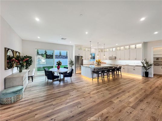 Dining room, Interior, Kitchen, Pendant Lights, Recessed Lighting, Stainless Steel Appliances, Wood Texture Flooring