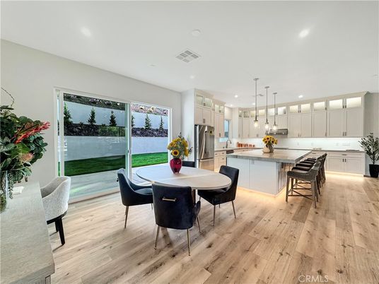 Dining room, Interior, Kitchen, Pendant Lights, Recessed Lighting, Stainless Steel Appliances, Wood Texture Flooring