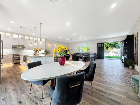 Dining room, Interior, Kitchen, Pendant Lights, Recessed Lighting, Stainless Steel Appliances, Wood Texture Flooring