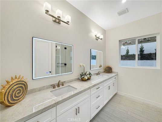 Bathroom, Dual Sink Vanities, Interior, Recessed Lighting, Tile Countertops, Wood Texture Flooring