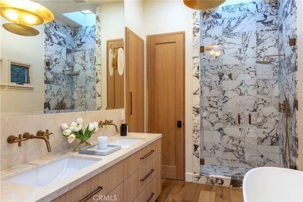 Bathroom, Dual Sink Vanities, Interior, Marble Walls, Wood Texture Flooring