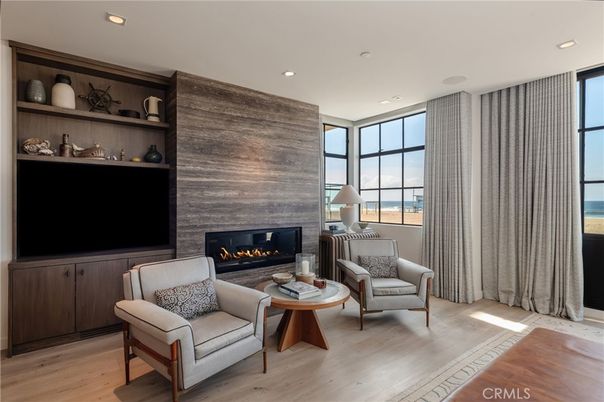Fireplace, Interior, Living room, Recessed Lighting, Water, Wood Texture Flooring