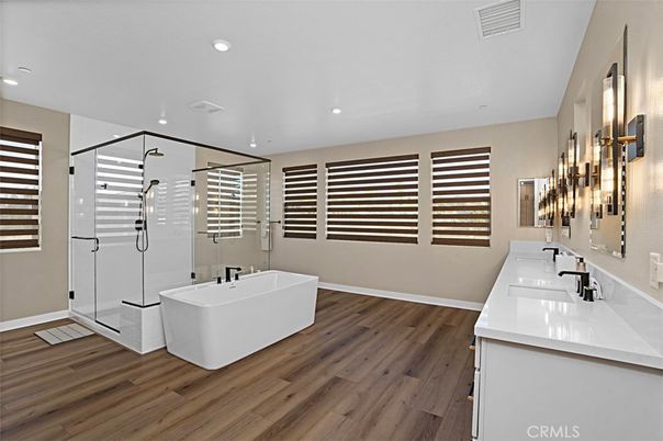 Bathroom, Dual Sink Vanities, Free Standing Baths, Glass Shower, Interior, Recessed Lighting, Wood Texture Flooring