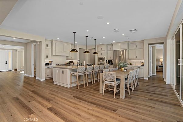 Dining room, Interior, Kitchen, Pendant Lights, Recessed Lighting, Stainless Steel Appliances, Wood Texture Flooring