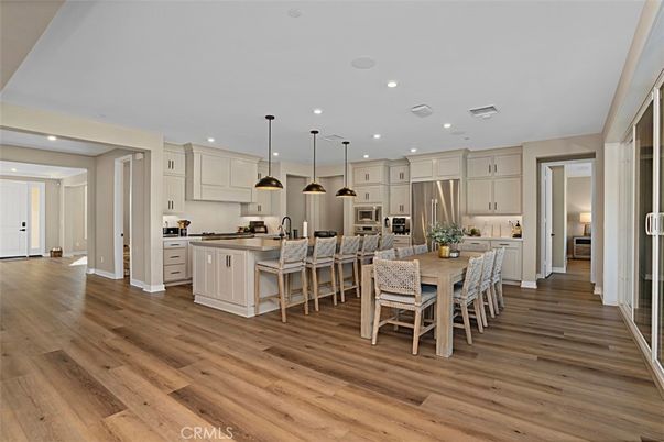 Dining room, Interior, Kitchen, Pendant Lights, Recessed Lighting, Stainless Steel Appliances, Wood Texture Flooring