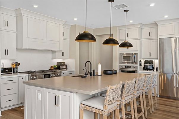 Interior, Kitchen, Pendant Lights, Recessed Lighting, Stainless Steel Appliances, Wood Texture Flooring