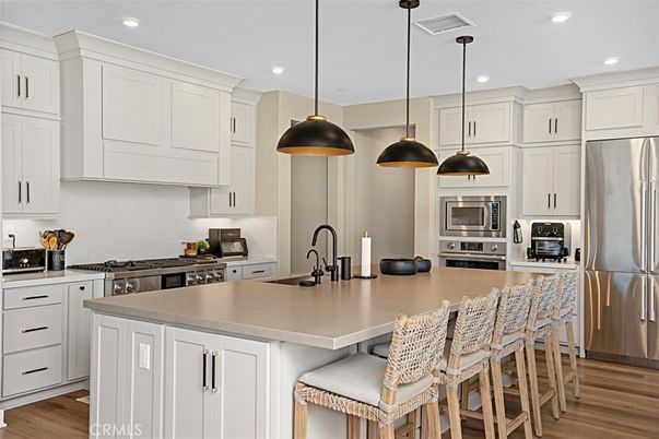 Interior, Kitchen, Pendant Lights, Recessed Lighting, Stainless Steel Appliances, Wood Texture Flooring