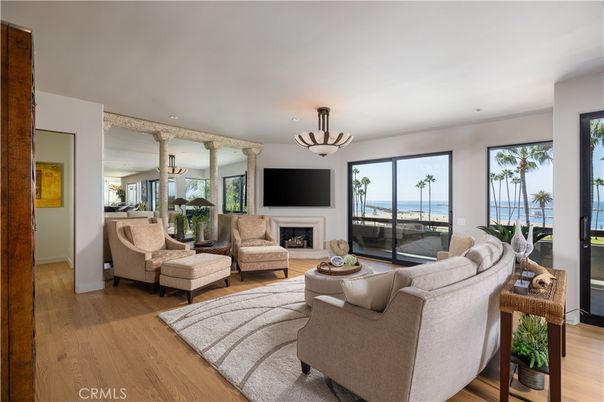 Fireplace, Interior, Living room, Recessed Lighting, Water, Wood Texture Flooring