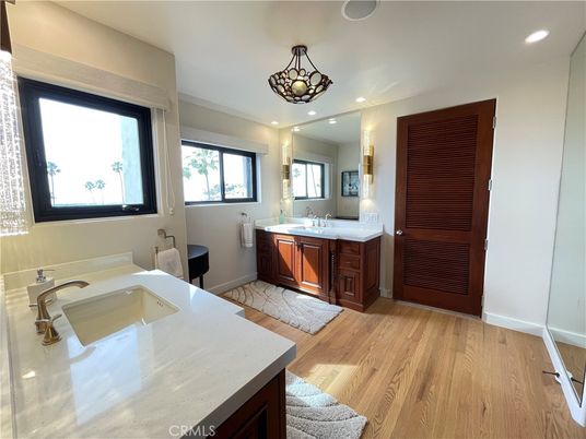 Bathroom, Dual Sink Vanities, Interior, Recessed Lighting, Wood Texture Flooring