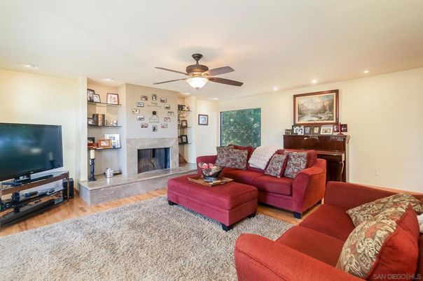 Fireplace, Interior, Living room, Piano, Recessed Lighting, Wood Texture Flooring