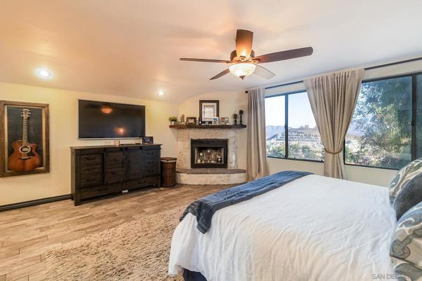 Bedroom, Fireplace, Interior, Recessed Lighting, Wood Texture Flooring