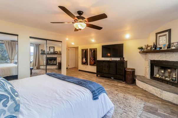 Bedroom, Fireplace, Interior, Recessed Lighting, Wood Texture Flooring