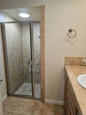 Bathroom, Glass Shower, Interior, Recessed Lighting, Tile Countertops