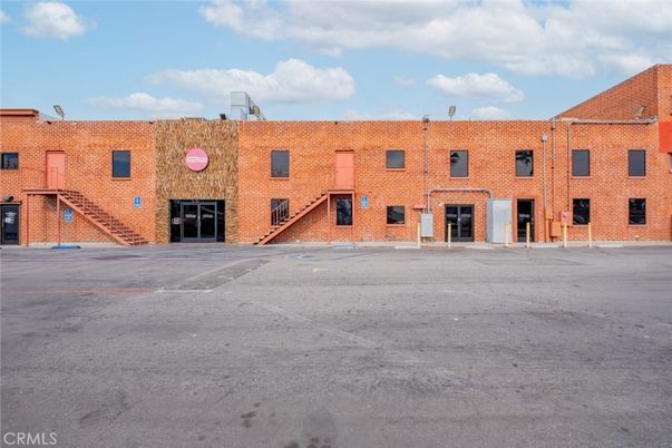 Exterior, Facade, Brick Facade, Condo Building