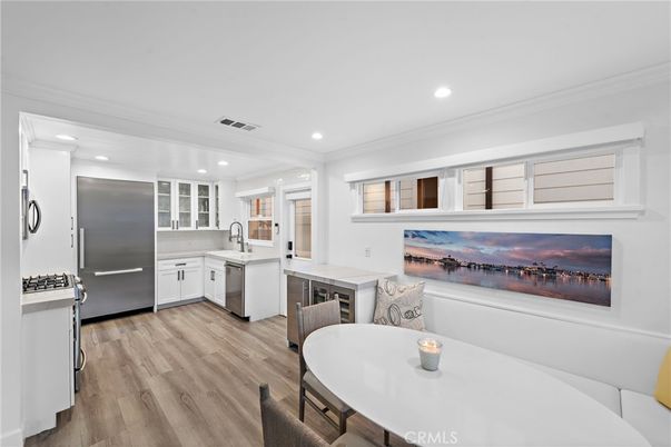 Dining room, Interior, Kitchen, Recessed Lighting, Stainless Steel Appliances, Wood Texture Flooring