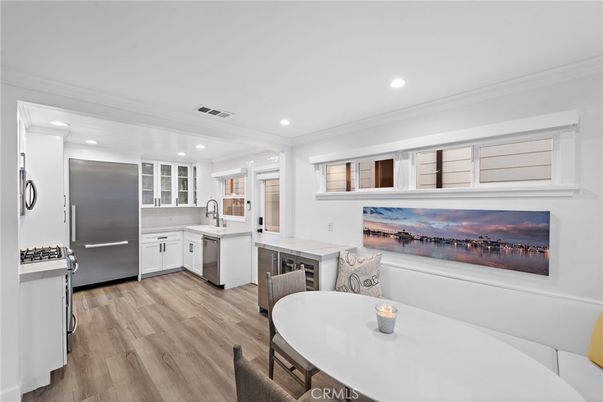 Dining room, Interior, Kitchen, Recessed Lighting, Stainless Steel Appliances, Wood Texture Flooring