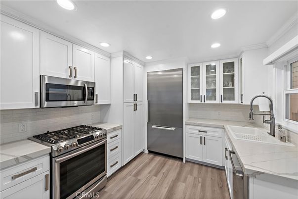 Interior, Kitchen, Recessed Lighting, Stainless Steel Appliances, Wood Texture Flooring