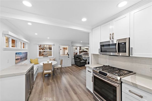Dining room, Interior, Kitchen, Recessed Lighting, Stainless Steel Appliances, Wood Texture Flooring