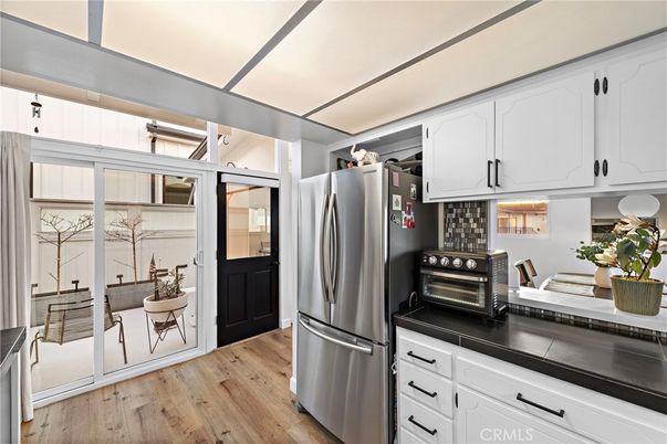 Interior, Kitchen, Tile Countertops, Wood Texture Flooring