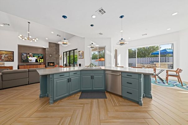 Dining room, Fireplace, Interior, Kitchen, Living room, Pendant Lights, Recessed Lighting, Stainless Steel Appliances, Wood Texture Flooring