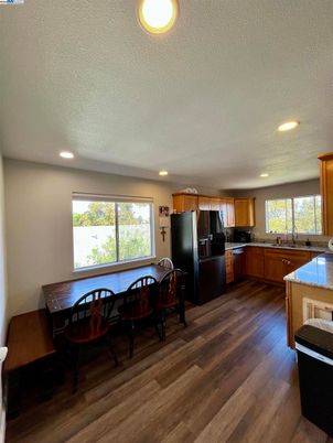 Dining room, Interior, Kitchen, Recessed Lighting, Stainless Steel Appliances, Wood Texture Flooring