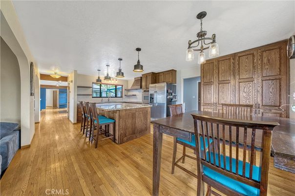 Dining room, Interior, Kitchen, Pendant Lights, Stainless Steel Appliances, Wood Texture Flooring
