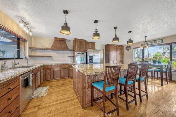 Dining room, Interior, Kitchen, Pendant Lights, Stainless Steel Appliances, Wood Texture Flooring