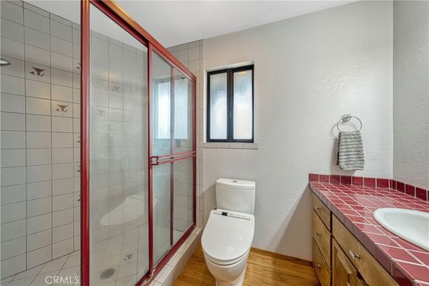 Bathroom, Glass Shower, Interior, Tile Countertops, Wood Texture Flooring