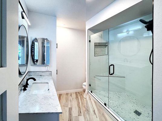 Bathroom, Dual Sink Vanities, Glass Shower, Interior, Wood Texture Flooring