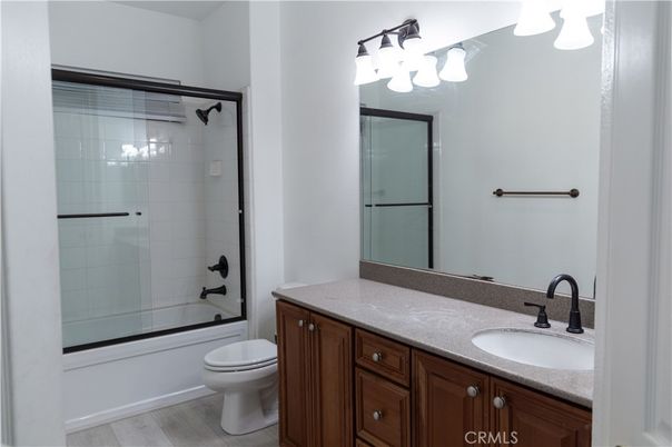 Bathroom, Dual Sink Vanities, Glass Shower, Interior, Wood Texture Flooring
