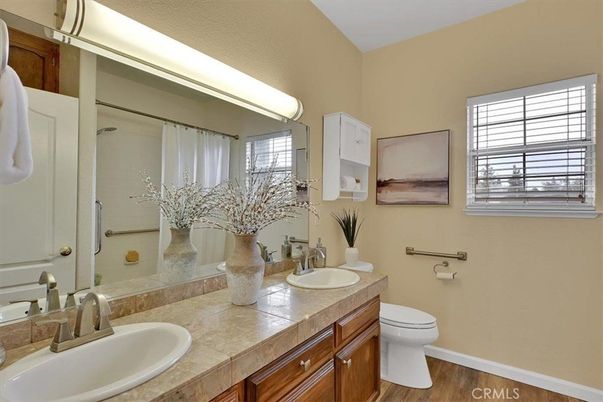Bathroom, Dual Sink Vanities, Interior, Tile Countertops, Wood Texture Flooring