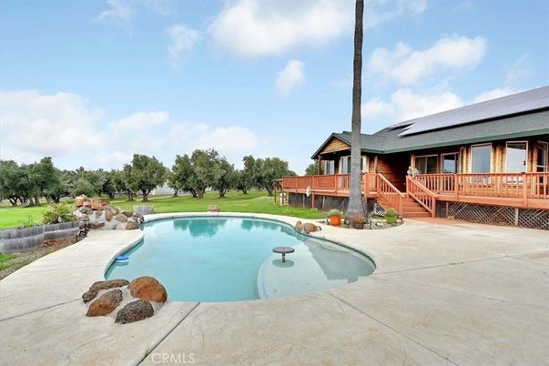 Exterior, Pool, Solar Panels
