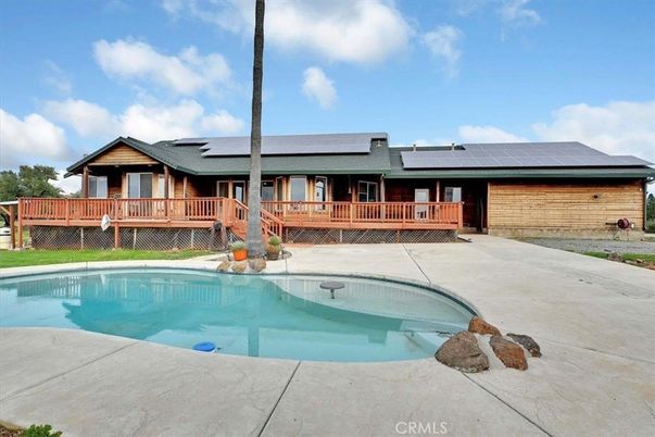 Exterior, Pool, Solar Panels