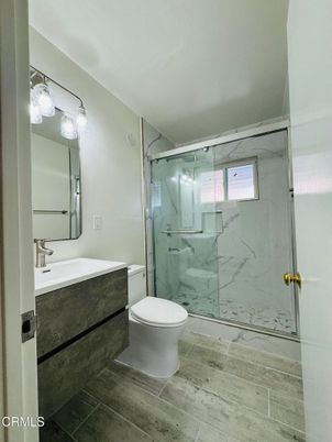 Bathroom, Glass Shower, Interior, Marble Walls, Wood Texture Flooring