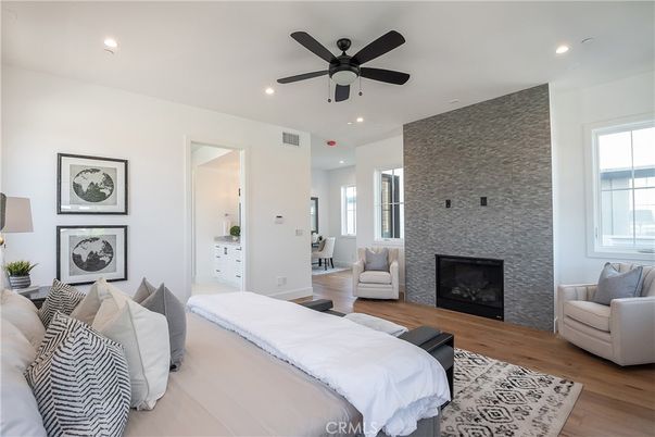 Bedroom, Fireplace, Interior, Recessed Lighting, Wood Texture Flooring