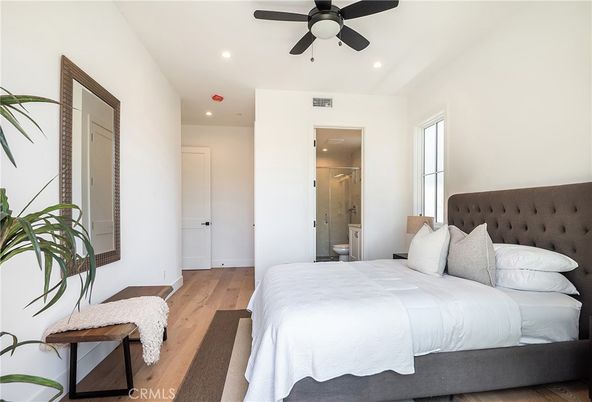 Bathroom, Bedroom, Glass Shower, Interior, Recessed Lighting, Wood Texture Flooring
