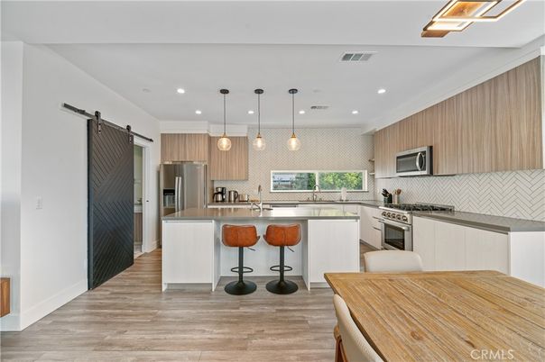 Interior, Kitchen, Pendant Lights, Recessed Lighting, Stainless Steel Appliances, Wood Texture Flooring