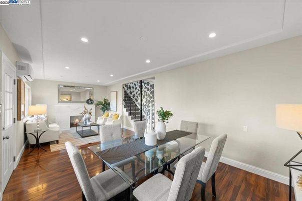 Dining room, Fireplace, Interior, Living room, Recessed Lighting, Wood Texture Flooring