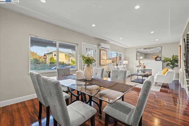 Dining room, Fireplace, Interior, Living room, Recessed Lighting, Wood Texture Flooring